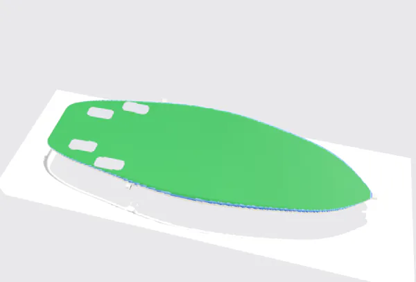 The carved board lifted off the table, bottom up, colored green with gray fin pockets and three short bridge stubs